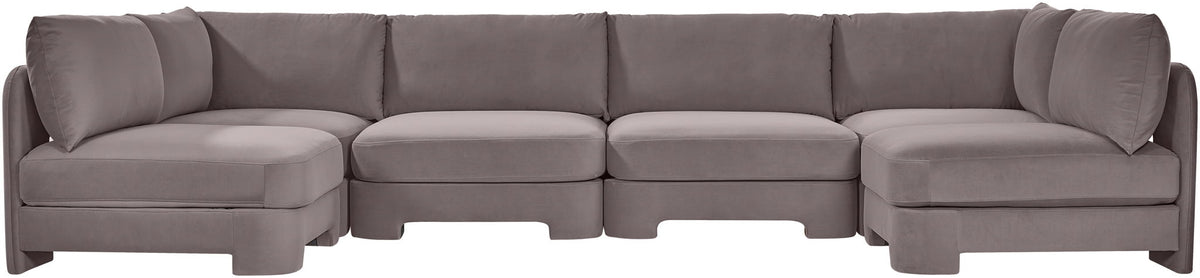 Gray velvet armless U-shaped sectional sofa with tufted back cushions