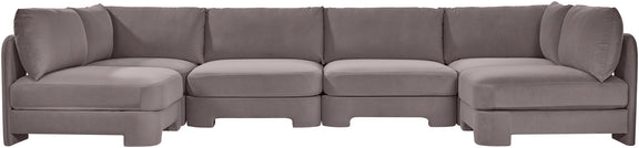 Gray velvet armless U-shaped sectional sofa with tufted back cushions