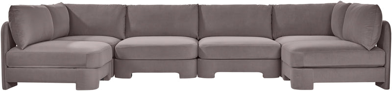 Gray velvet armless U-shaped sectional sofa with tufted back cushions
