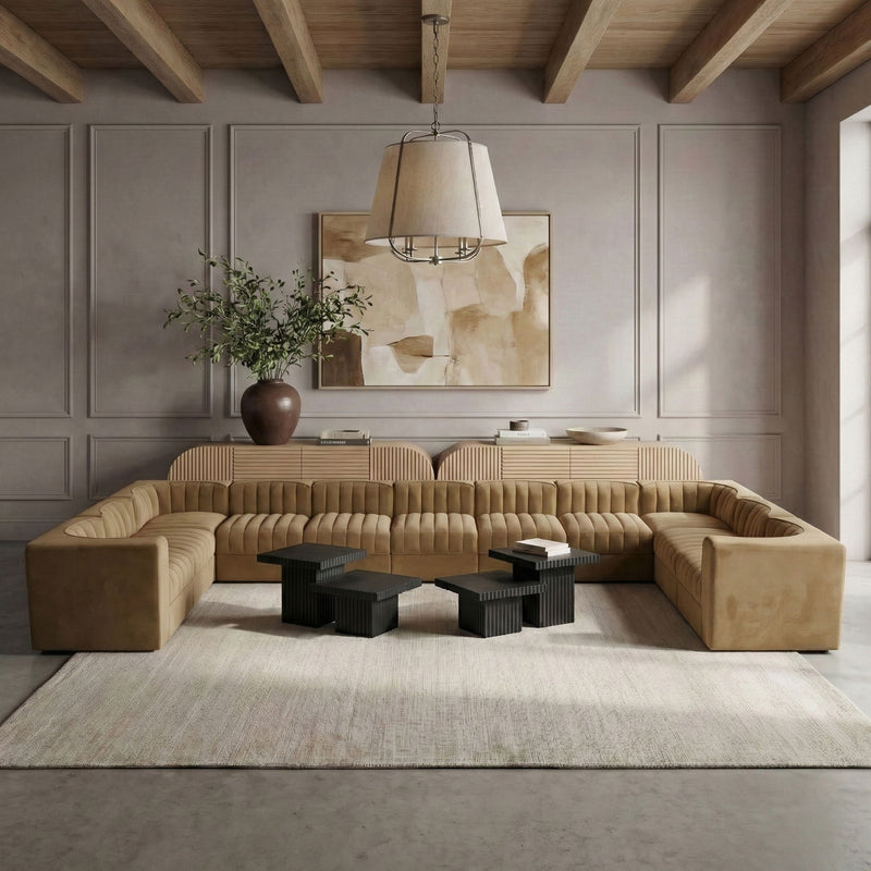 Velvet modular sectional sofa with tufted cushions, beige upholstery, low corner arm sections