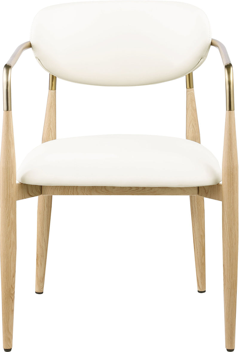 Vegan leather dining arm chair with white seat and rounded back, curved gold-tone arms, wood legs
