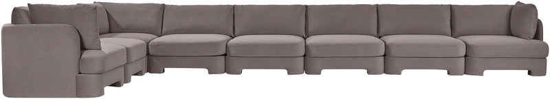 Light gray L-shaped velvet sectional sofa with straight arms and multiple seat modules