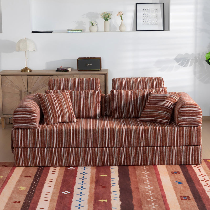 Red striped sleeper sofa with rounded armrests and multiple back cushions