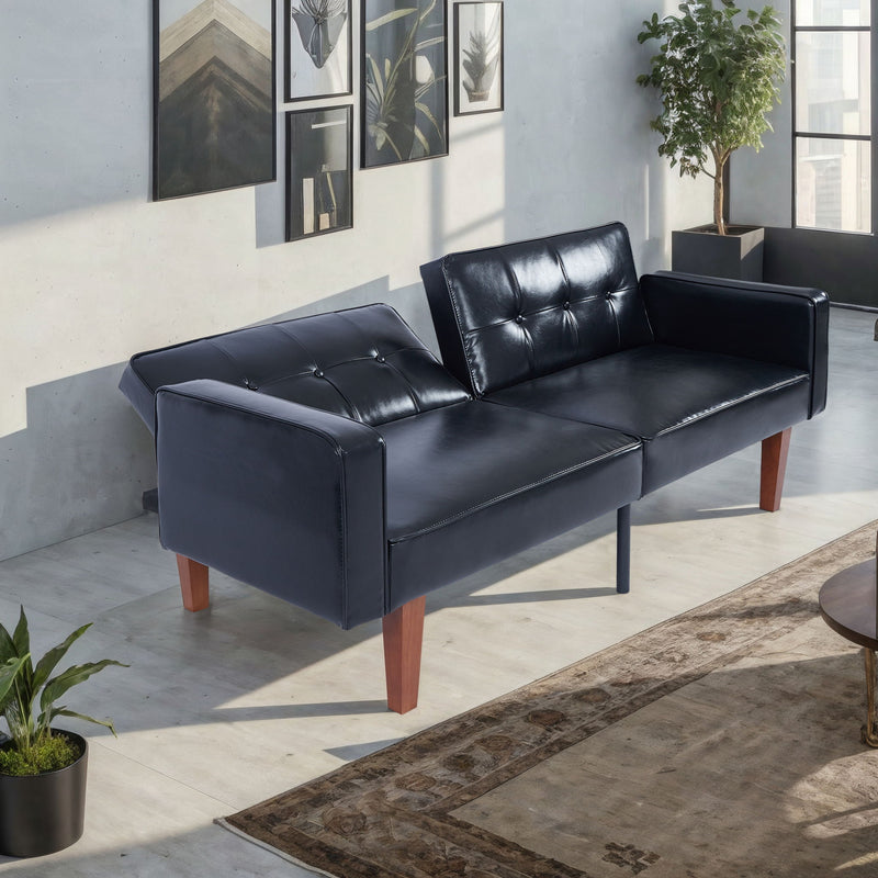 Black split-back futon sofa bed with tufted back cushions and padded armrests