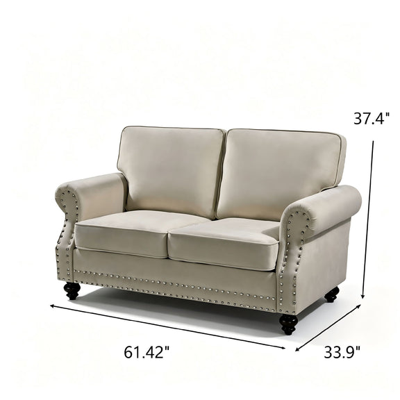 Beige 2-seat loveseat sofa with nailhead trim and turned legs, two cushioned seats