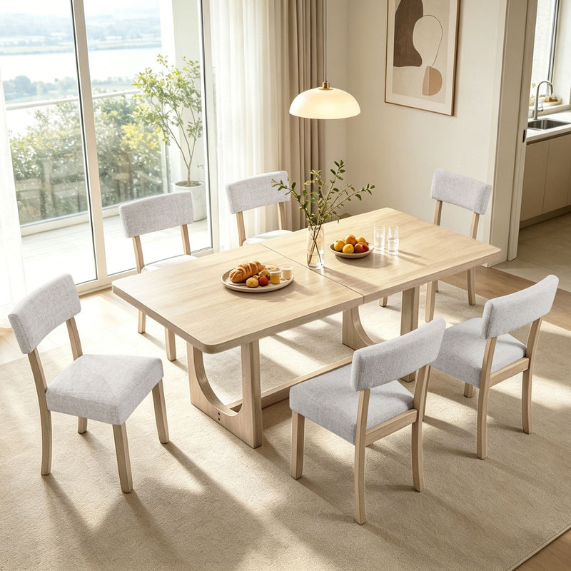 Corner view of a dining table set with light oak rectangular table and six light gray chairs