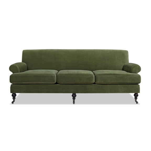 Three-cushion tightback sofa in dark green fabric, rounded arms, turned feet