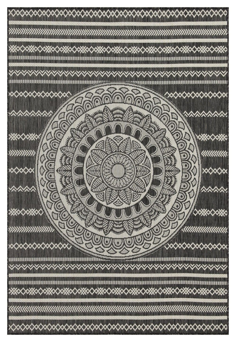 Indoor/outdoor area rug with dark and light gray circular mandala and geometric border