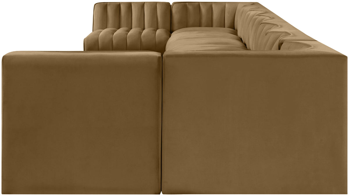 Beige armless velvet modular sectional with tufted back cushions and chaise