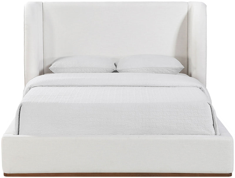 Fabric upholstered bed with tall headboard and pearl silver upholstered platform base