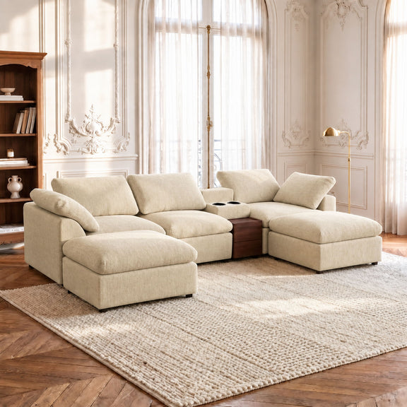 Beige modular sectional sofa with chaise ottomans and storage console