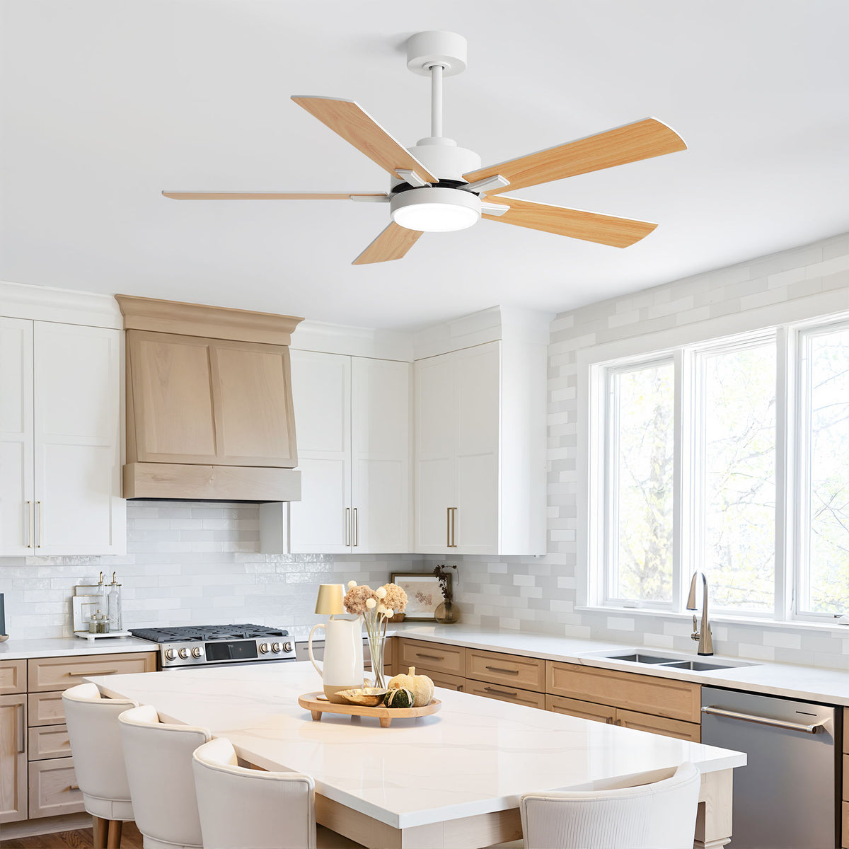 White ceiling fan with integrated light and reversible wood-tone blades