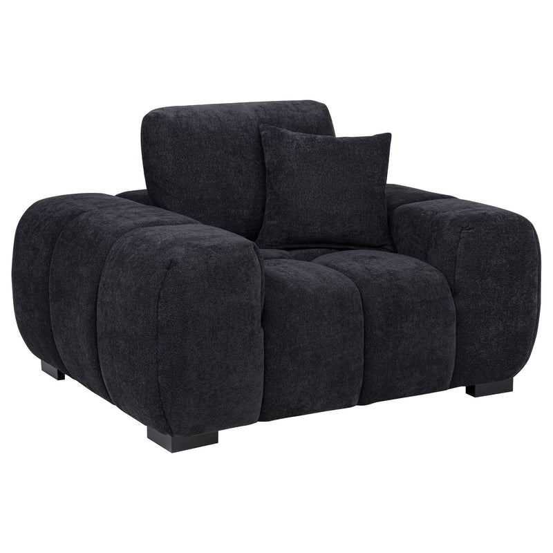 Dark gray track arm accent chair with tufted seat cushions and rounded arms