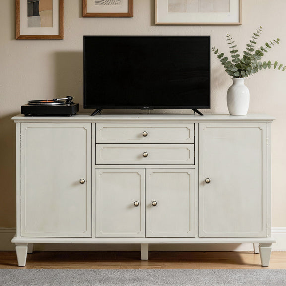 White sideboard cabinet with four doors and two drawers, styled as a TV console
