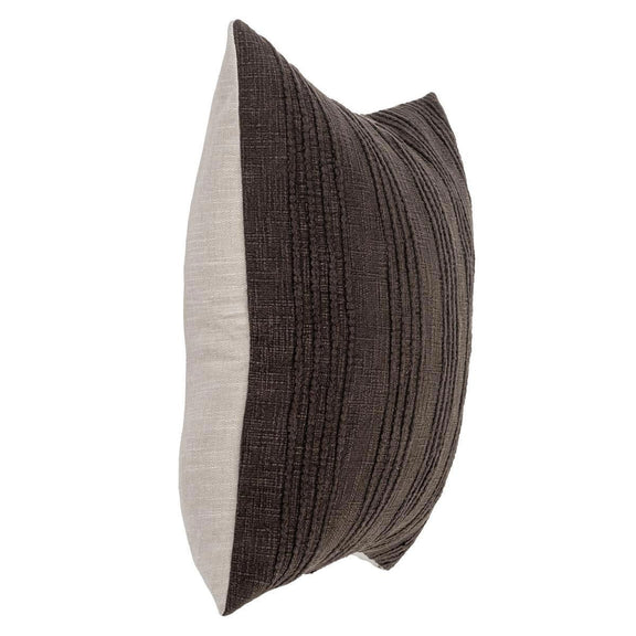 Two-tone dark brown and cream lumbar pillow shown from the side