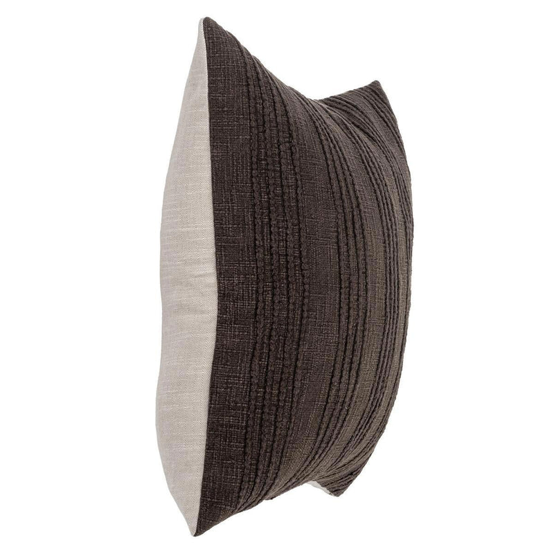 Two-tone dark brown and cream lumbar pillow shown from the side