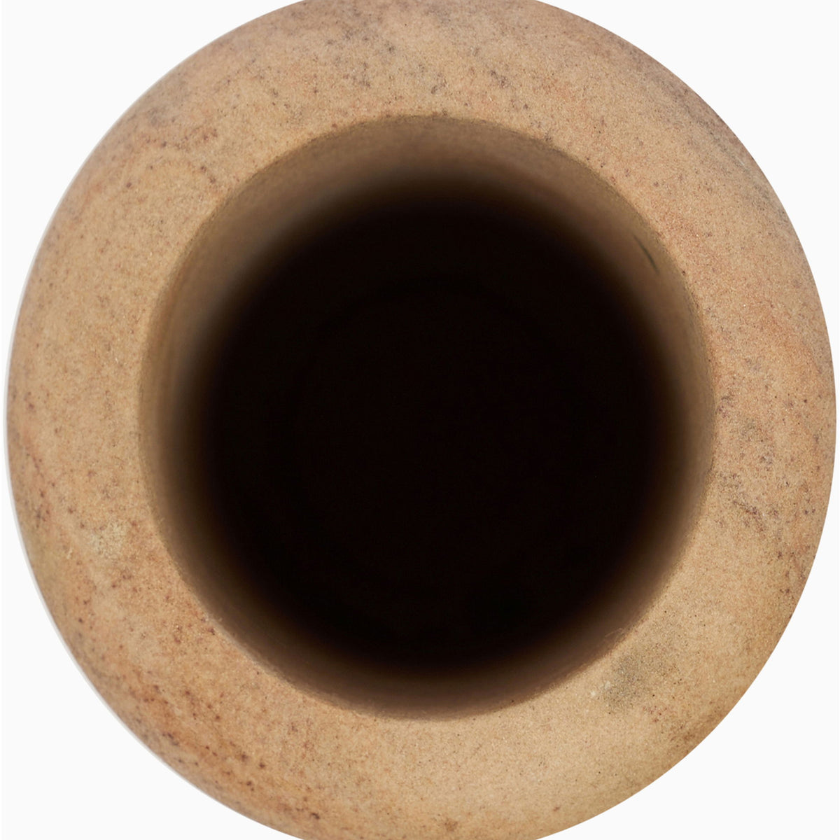 Sandstone vase interior view with wide mouth and speckled sand texture