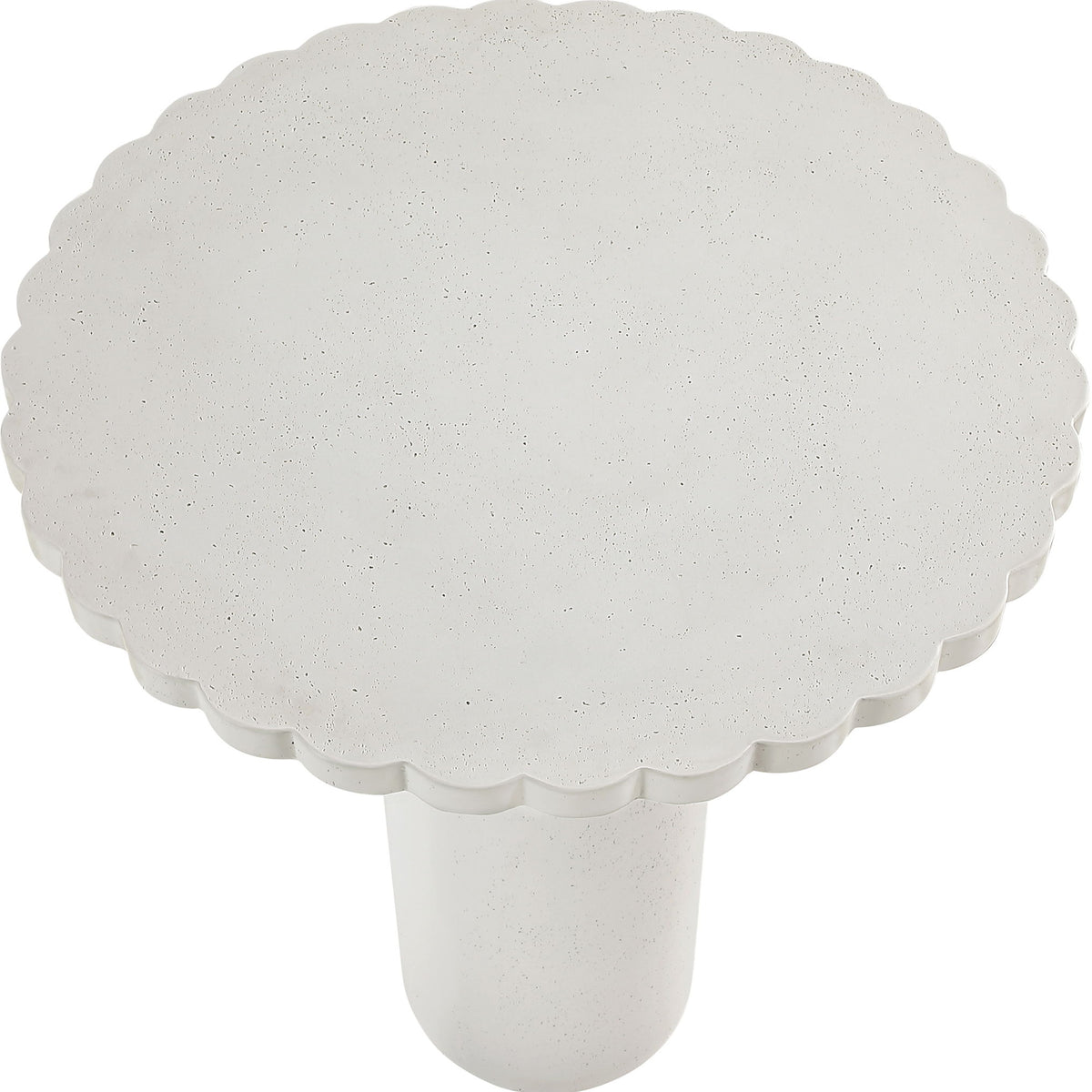 White speckled table pedestal in scalloped rounded shape