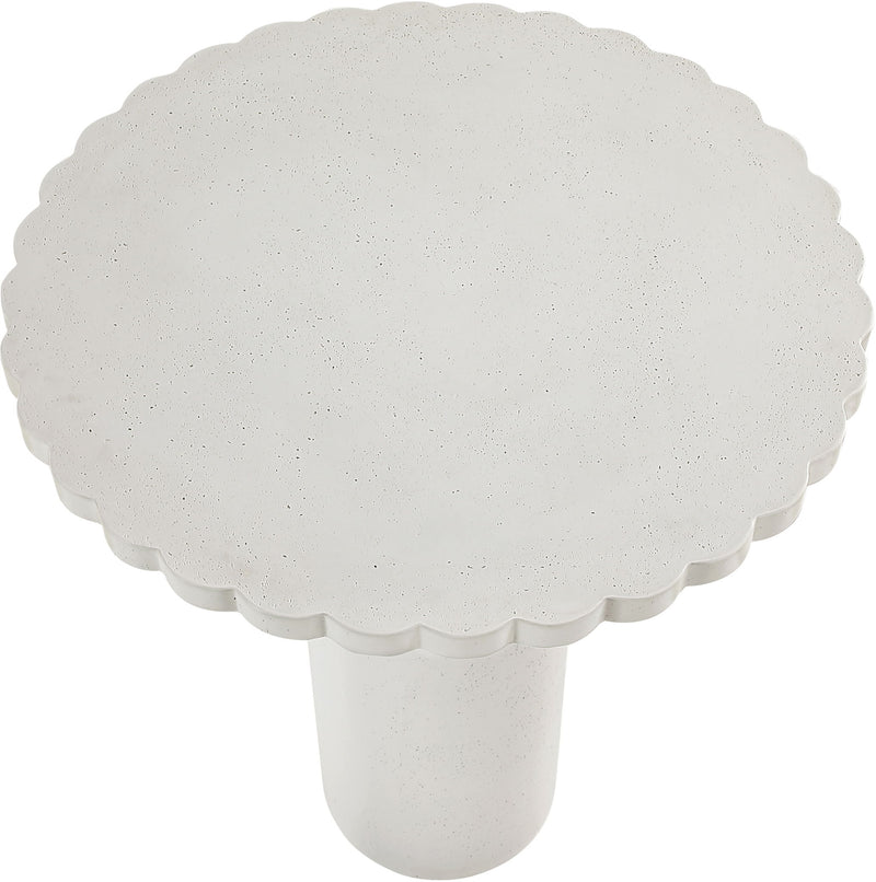 White speckled table pedestal in scalloped rounded shape
