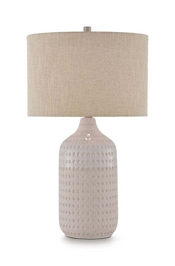Ceramic table lamp with beige fabric shade and textured beige-white ceramic body