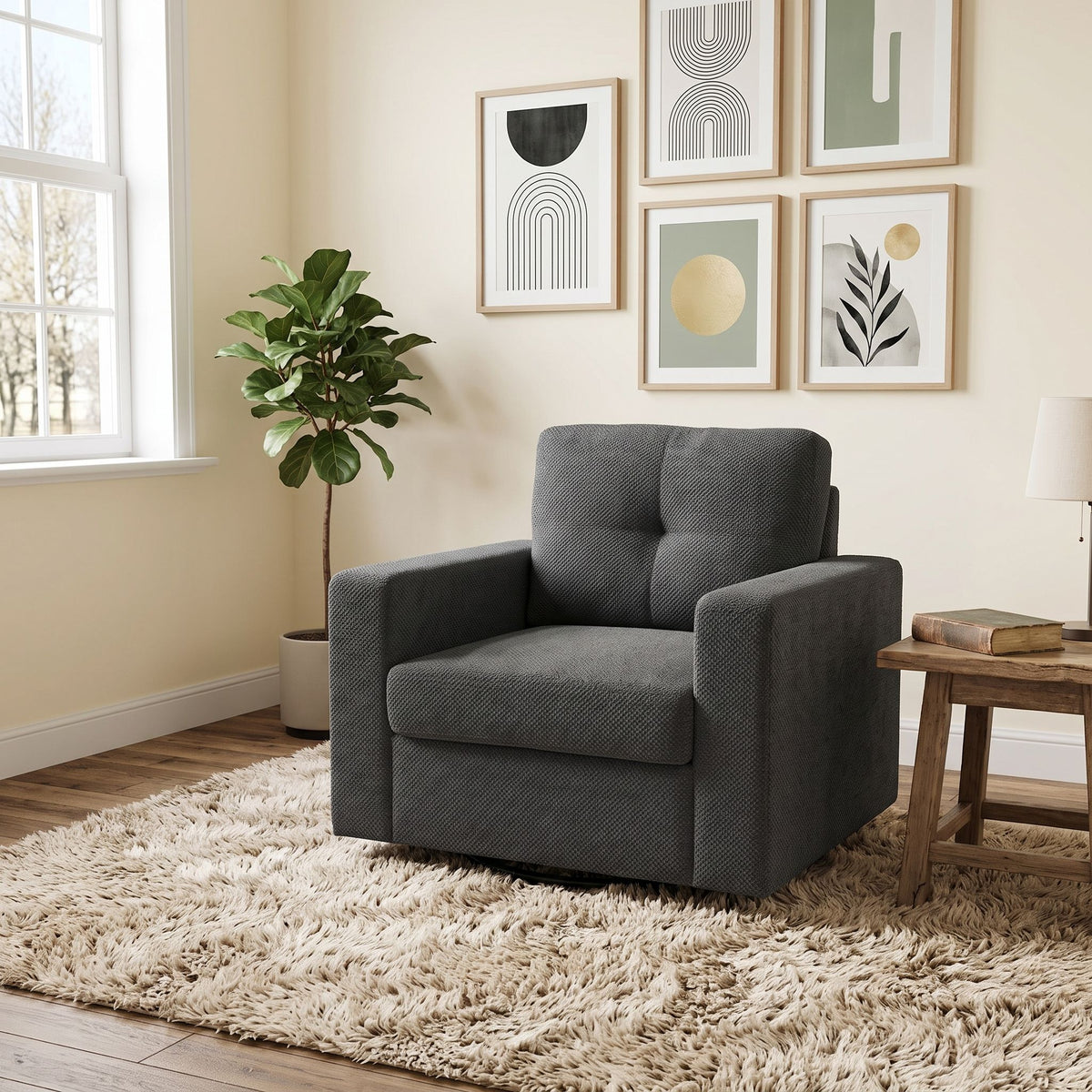 Dark gray upholstered swivel lounge chair with wide arms and cushioned seat