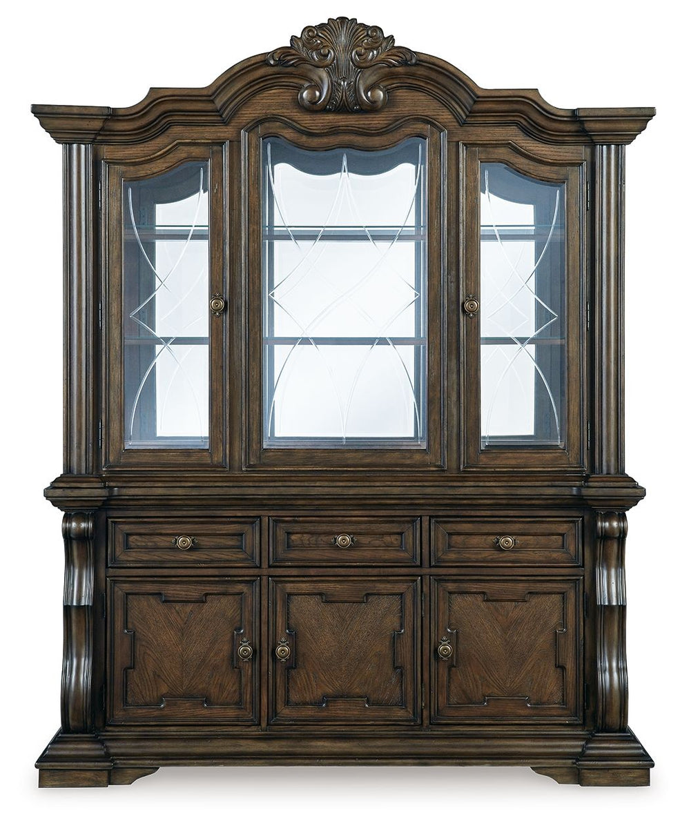 Dark brown dining buffet hutch with three vertical glass doors and three-drawer base