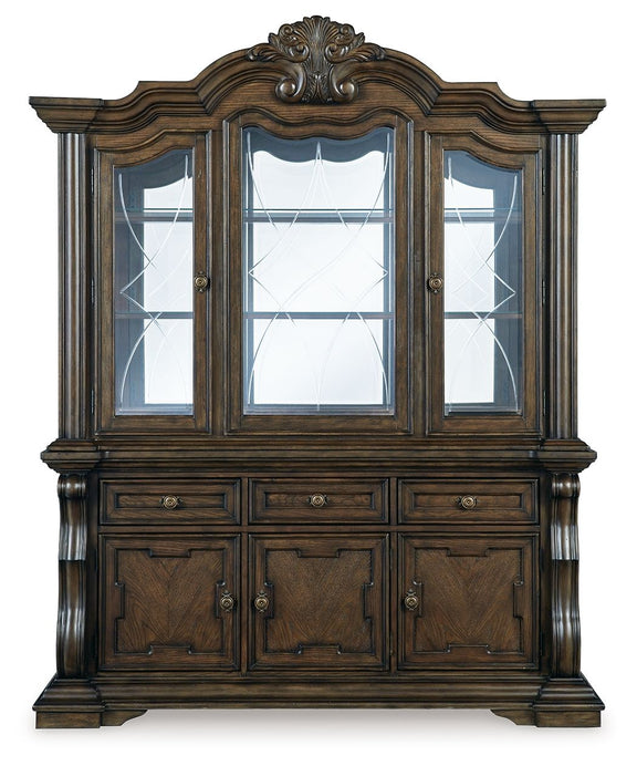 Dark brown dining buffet hutch with three vertical glass doors and three-drawer base