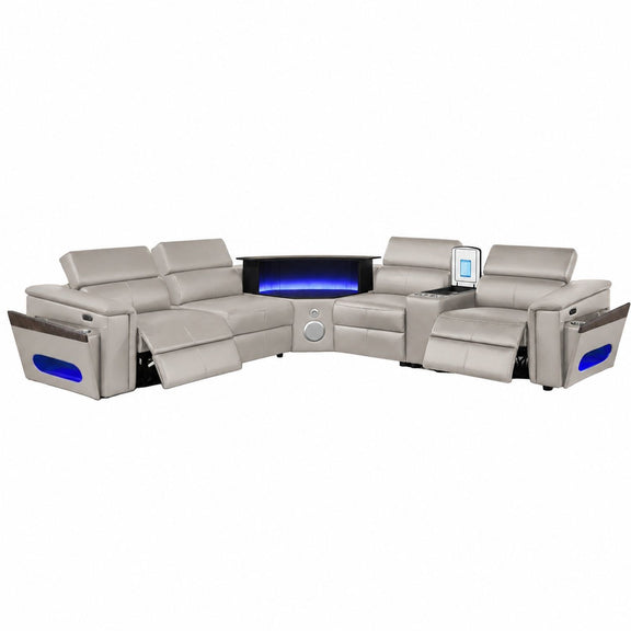 Light gray sectional sofa with blue LED panel and control display on armrest
