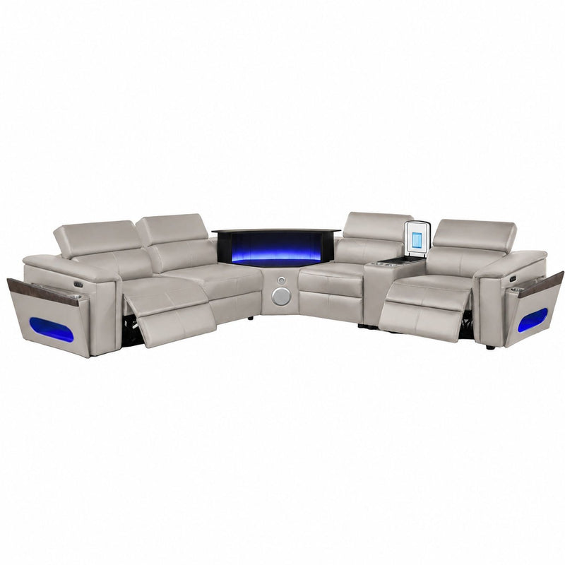 Light gray sectional sofa with blue LED panel and control display on armrest