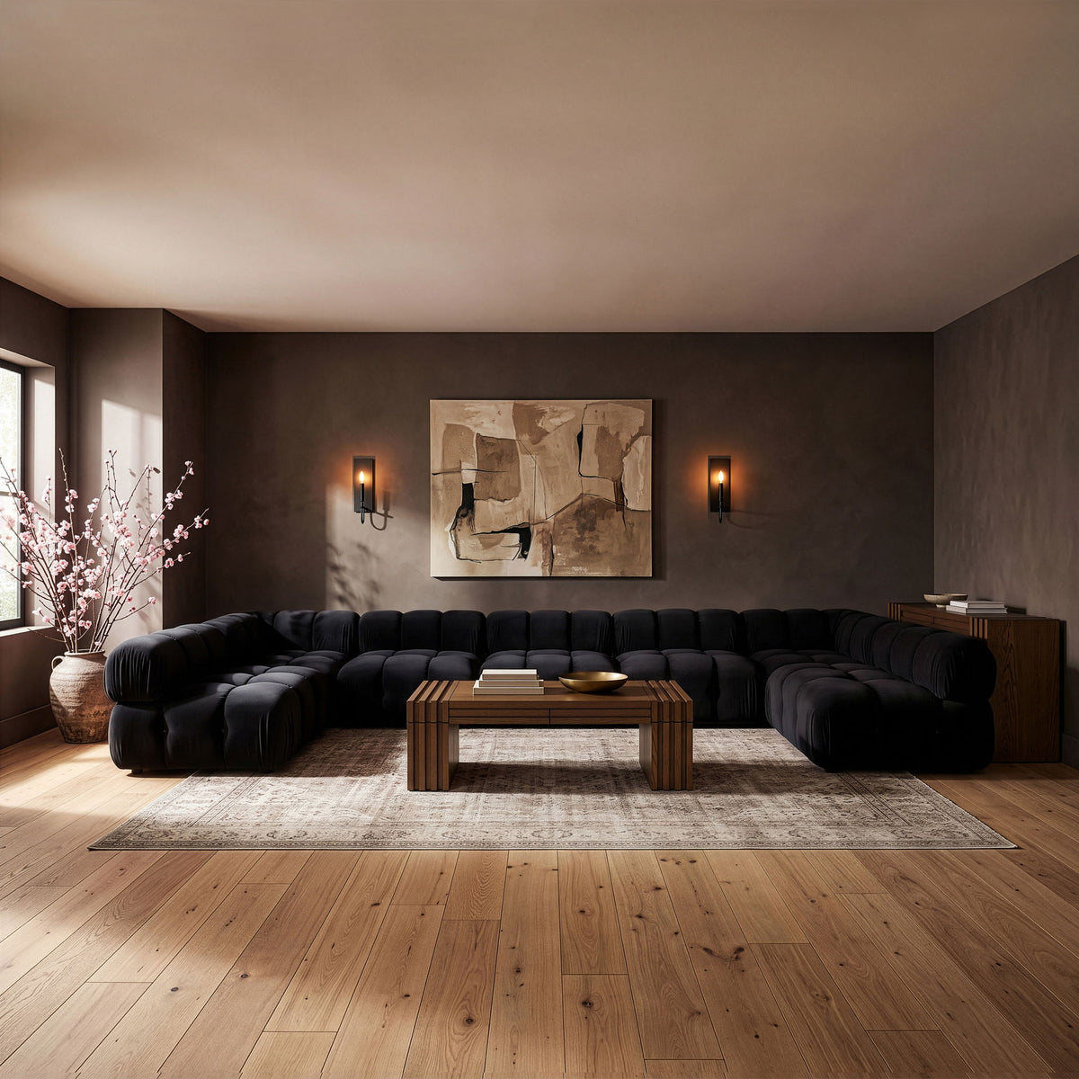 Black U-shaped modular sectional sofa with tufted cushions and rounded corners