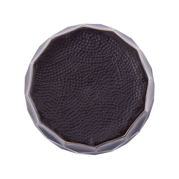 Round end table bottom with textured surface and faceted octagonal edge