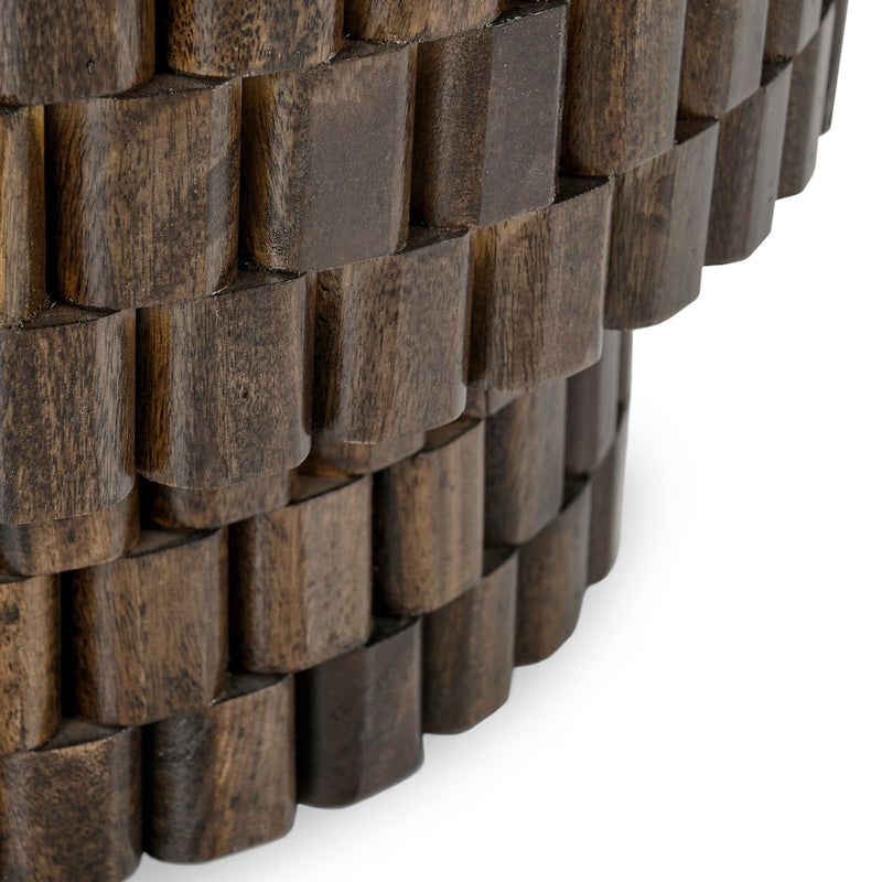 Detail view of dark brown woven wood blocks on round table base