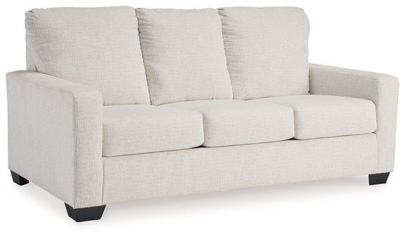 Beige fabric 3-seat sofa with three back cushions and neatly padded seat cushions