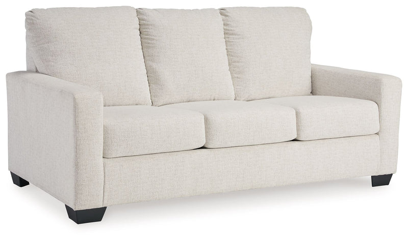 Beige fabric 3-seat sofa with three back cushions and neatly padded seat cushions