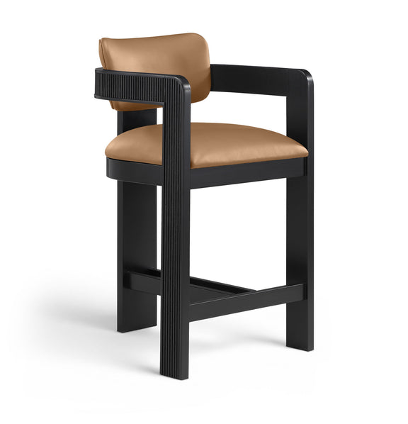 Beige vegan leather counter stool with padded seat, fluted back panel, black frame