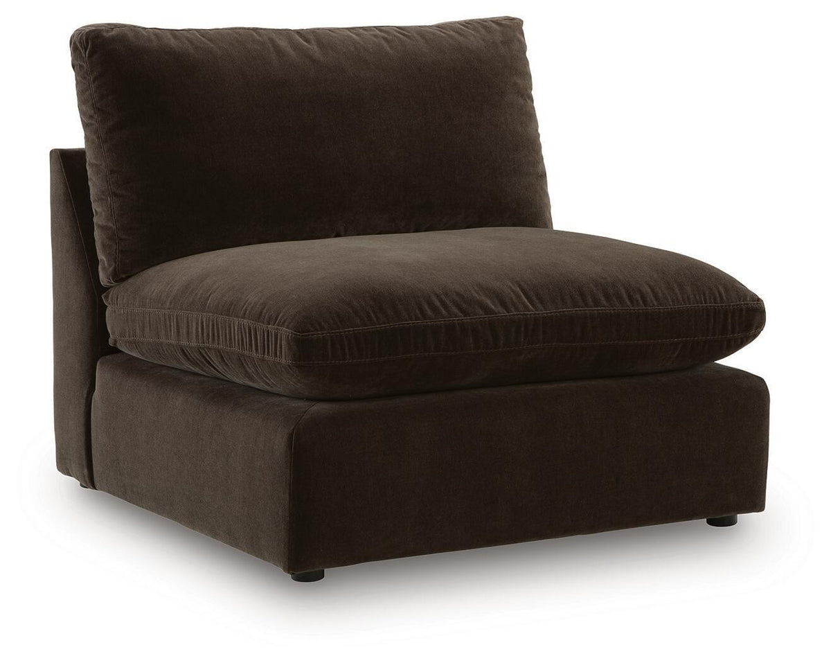 Dark brown sectional chaise with one back pillow and wide padded seat.