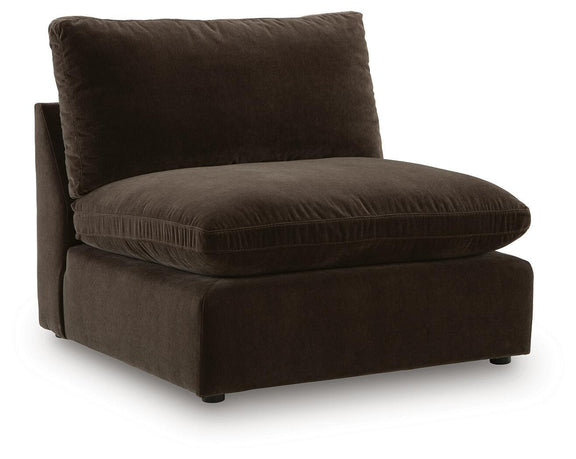Dark brown sectional chaise with one back pillow and wide padded seat.