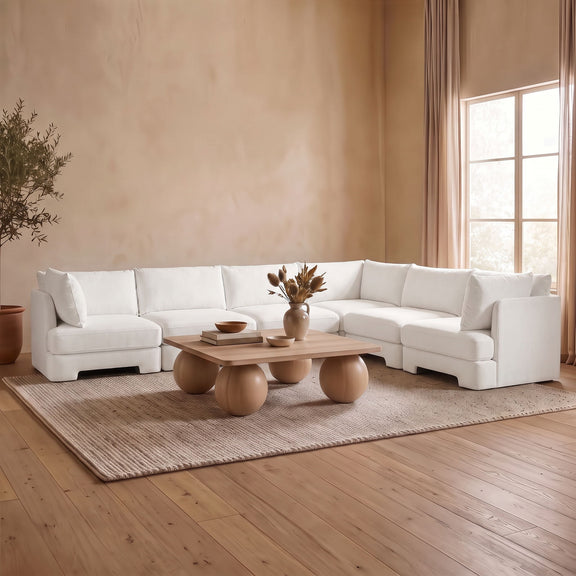 White velvet corner sectional sofa with chaise seats, square arms, and cushions