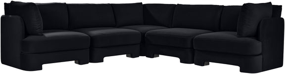 Black velvet corner sectional sofa with long chaise and back cushions