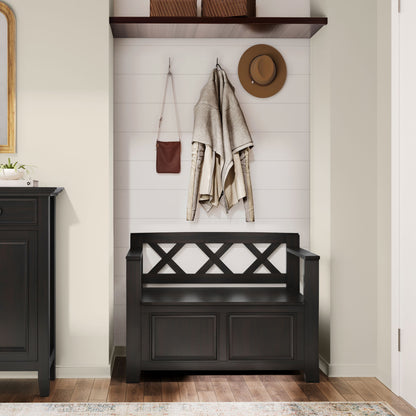 Dark brown entryway storage bench with X-back panel and cabinet doors