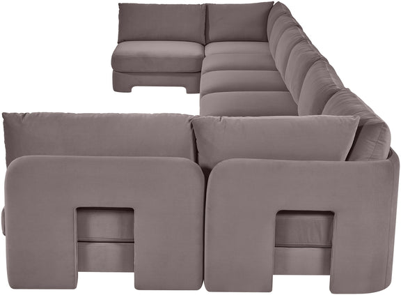 Medium gray velvet U-shaped armless sectional sofa with padded cushions and chaise backrests