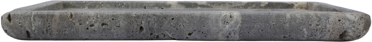 Round gray travertine tray with thick rim and speckled stone surface