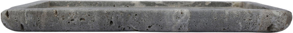Round gray travertine tray with thick rim and speckled stone surface
