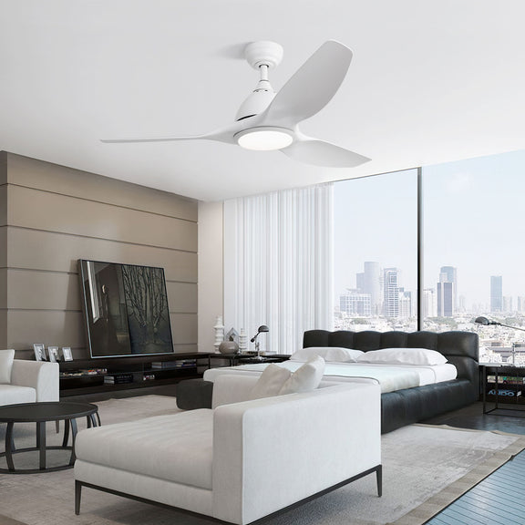 White ceiling fan with three blades and frosted light fixture in a living room