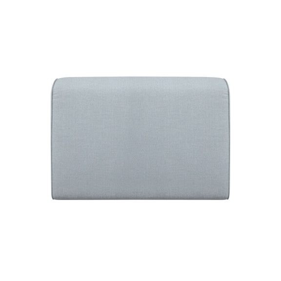 Light blue upholstered outdoor slipper chair back with smooth fabric panel