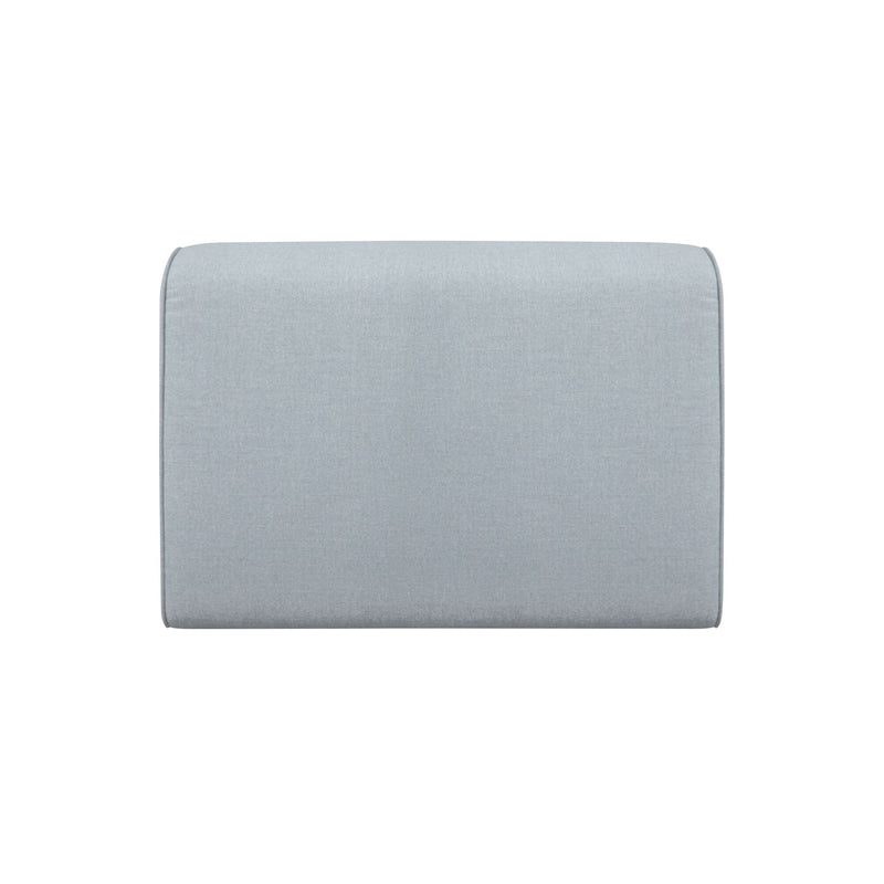 Light blue upholstered outdoor slipper chair back with smooth fabric panel