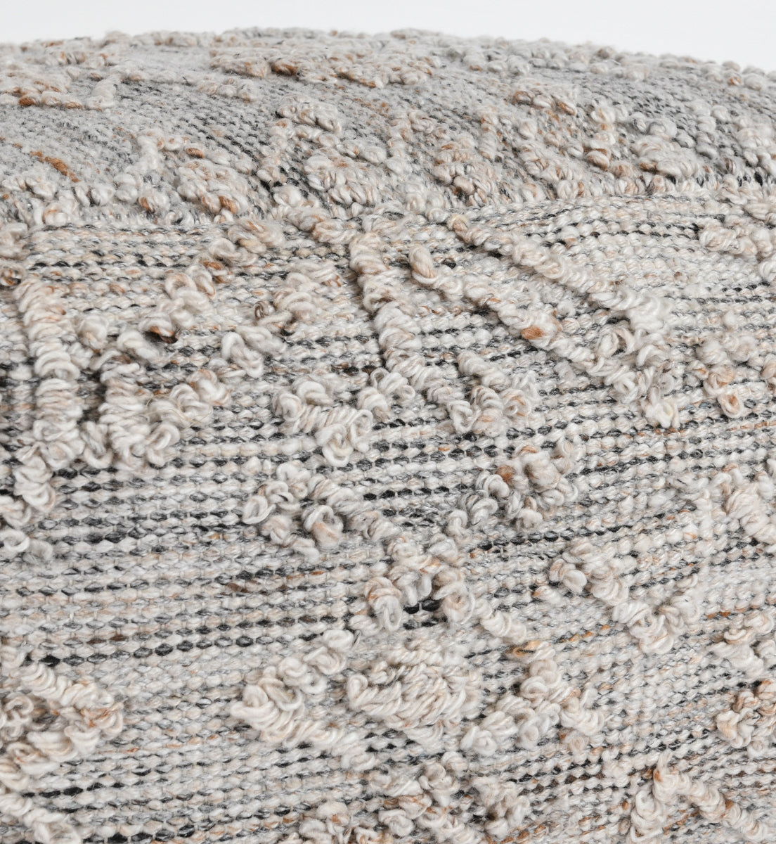 Gray multi pouf fabric close-up, boucle loops and striped knit threads