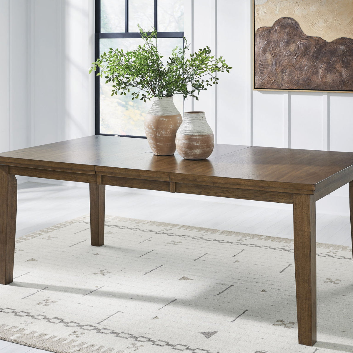 Urbinforte - Dining Room Butterfly Extension Table - Light Brown