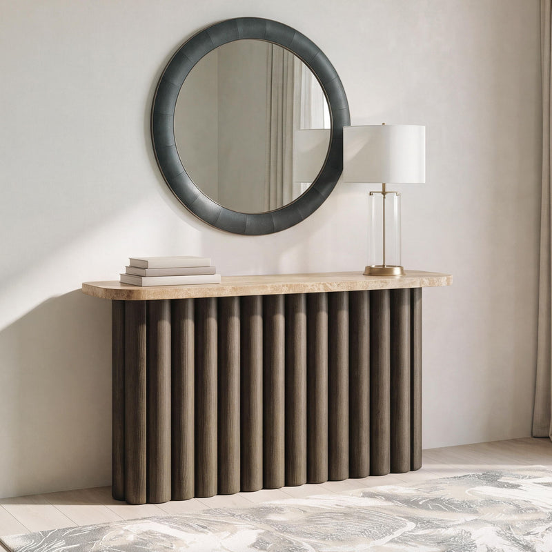 Rectangular sofa table with speckled stone tabletop and dark ribbed pedestal base