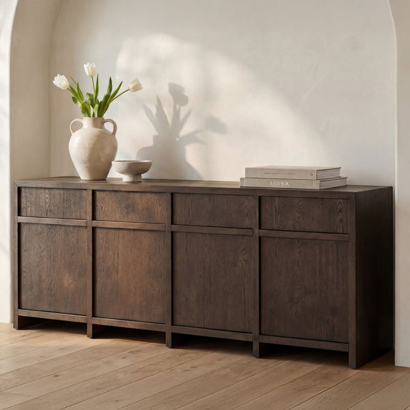 Brown sideboard with multiple cabinet doors and drawers for storage